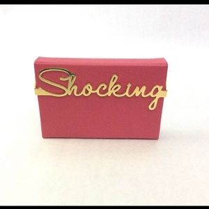 Charlotte Olympia hot pink clutch with box & cover.it opens to a mirrored vanity
